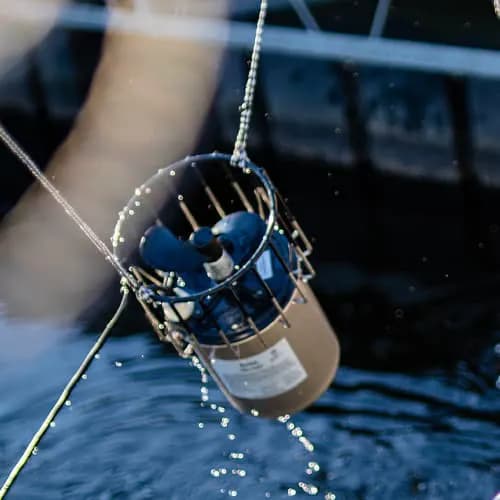 Open water around a dock kept by a Kasco de-icer